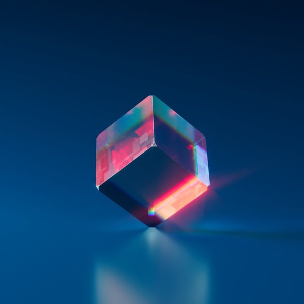 A vertical glowing glass cube.